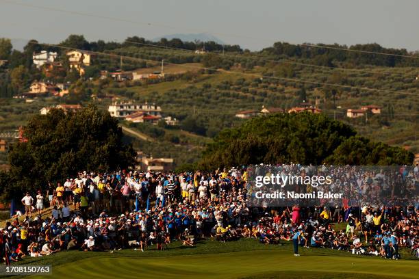 Robert MacIntyre of Team Europe putts on the 12th green during the Friday afternoon fourball matches of the 2023 Ryder Cup at Marco Simone Golf Club...