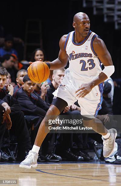 Guard Michael Jordan of the Washington Wizards dribbles against the Memphis Grizzlies during the game at MCI Center on December 18, 2002 in...