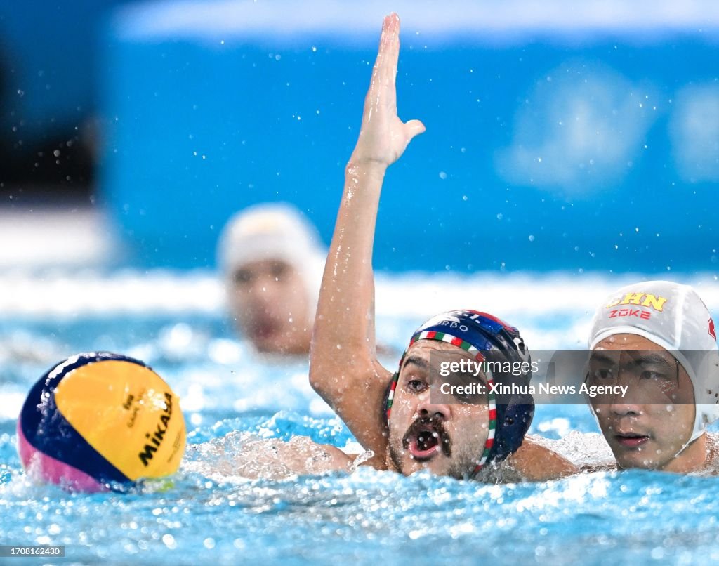 Saul Rostamian Soheil Rostamian L of Iran and Hu Zhangxin of China compete during ...