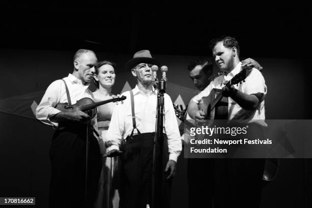 Traditional folk and old-timey musicians including fiddler Fred Price, folk singer Jean Ritchie, banjoist, musician and singer Clarence Ashley,...