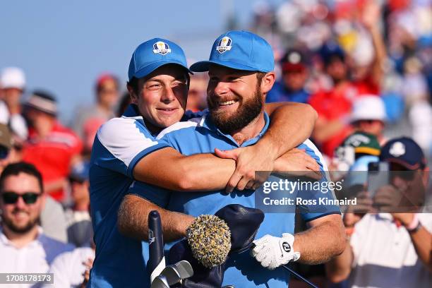 Tyrrell Hatton and Viktor Hovland of Team Europe celebrate on the 16th tee during the Friday afternoon fourball matches of the 2023 Ryder Cup at...