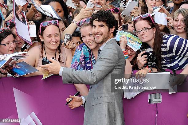 Darren Criss poses with fans during the 'Imogene' Paris Premiere as part of The Champs Elysees Film Festival 2013 at Publicis Champs Elysees on June...