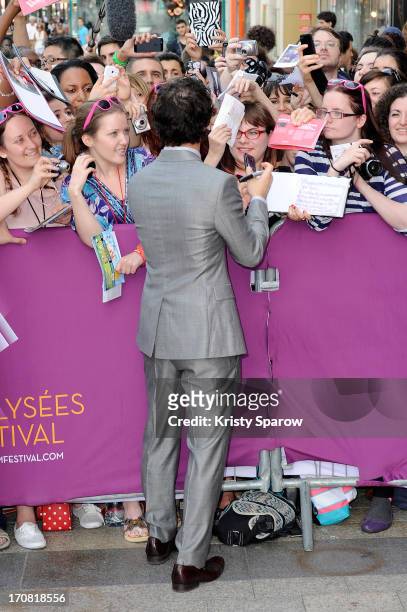 Darren Criss poses with fans during the 'Imogene' Paris Premiere as part of The Champs Elysees Film Festival 2013 at Publicis Champs Elysees on June...