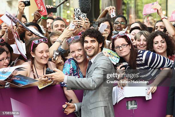 Darren Criss poses with fans during the 'Imogene' Paris Premiere As Part of The Champs Elysees Film Festival 2013 at Publicis Champs Elysees on June...