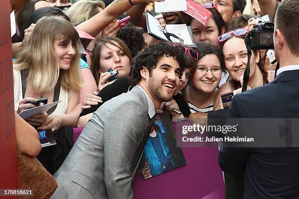 Darren Criss poses with fans during the 'Imogene' Paris Premiere As Part of The Champs Elysees Film Festival 2013 at Publicis Champs Elysees on June...