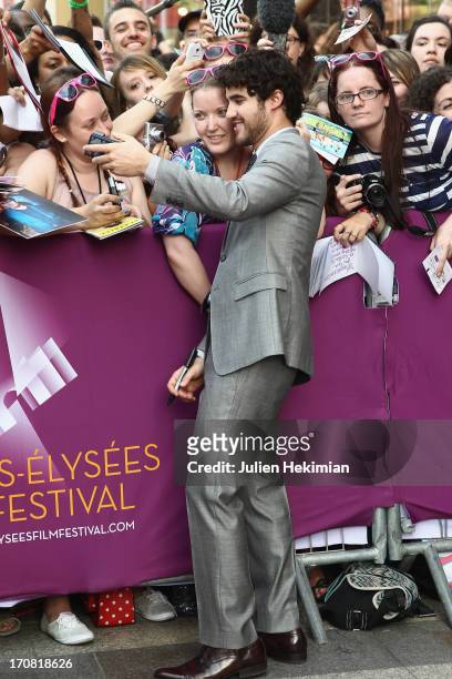 Darren Criss poses with fans during the 'Imogene' Paris Premiere As Part of The Champs Elysees Film Festival 2013 at Publicis Champs Elysees on June...