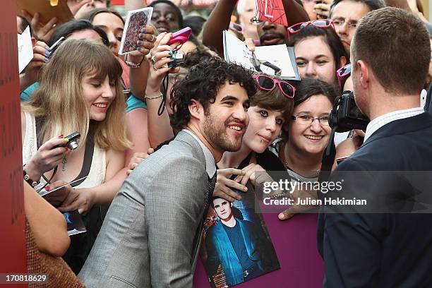 Darren Criss poses with fans during the 'Imogene' Paris Premiere As Part of The Champs Elysees Film Festival 2013 at Publicis Champs Elysees on June...