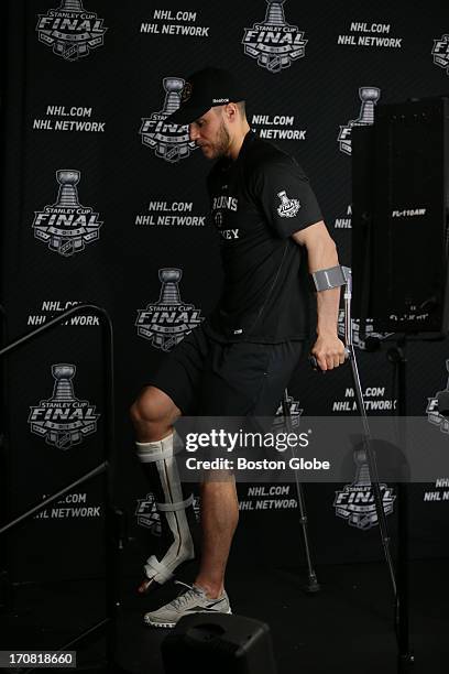 Bruins Gregory Campbell, who was injured in a game against the Pittsburgh Penguins in the last series, leaves this afternoon's press conference,...