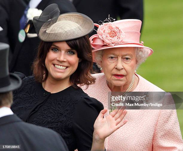 Princess Eugenie of York and Queen Elizabeth II attend Day 1 of Royal Ascot at Ascot Racecourse on June 18, 2013 in Ascot, England.