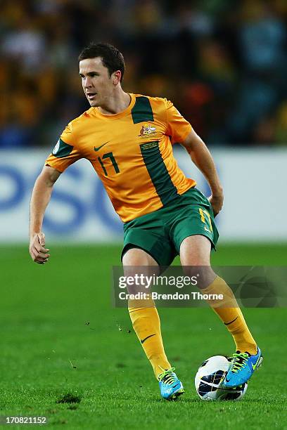 Matt McKay of Australia controls the ball during the FIFA 2014 World Cup Asian Qualifier match between the Australian Socceroos and Iraq at ANZ...