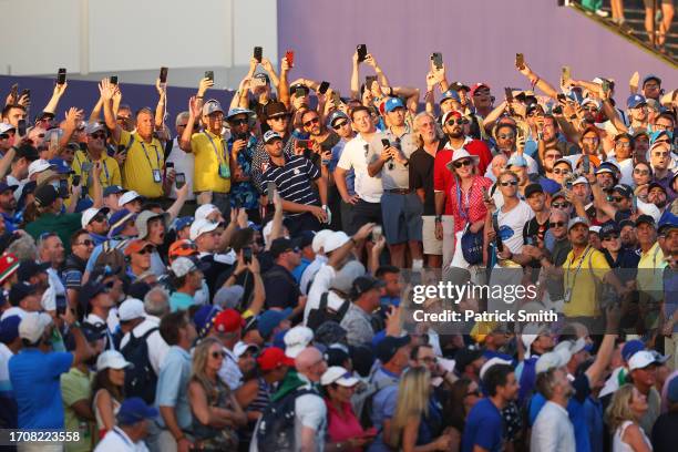 Crowds watch on as Wyndham Clark of Team United States plays his shot during the Friday afternoon fourball matches of the 2023 Ryder Cup at Marco...
