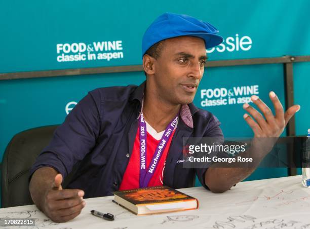 Celebrity chef Marcus Samuelsson signs copies of his book "Yes, Chef" on June 14 in Aspen, Colorado. The 31st Annual Food & Wine Classic brings...