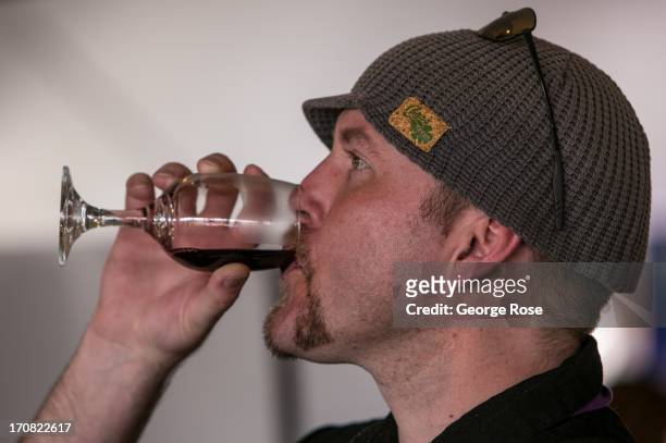 Man samples a taste of wine during the Aspen Food & Wine Classic Grand Tasting on June 14 in Aspen, Colorado. The 31st Annual Food & Wine Classic...