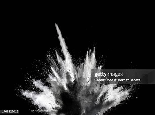 shock wave from an explosion of dust and smoke on a black background. - cráter de meteorito fotografías e imágenes de stock