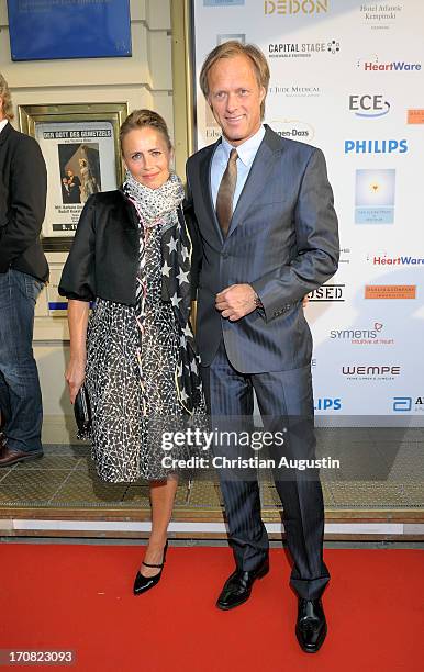 Gerhard Delling and Isabelle Delling attend charity event "Das kleine Herz im Zentrum" at St. Pauli Theater on June 10, 2013 in Hamburg, Germany.