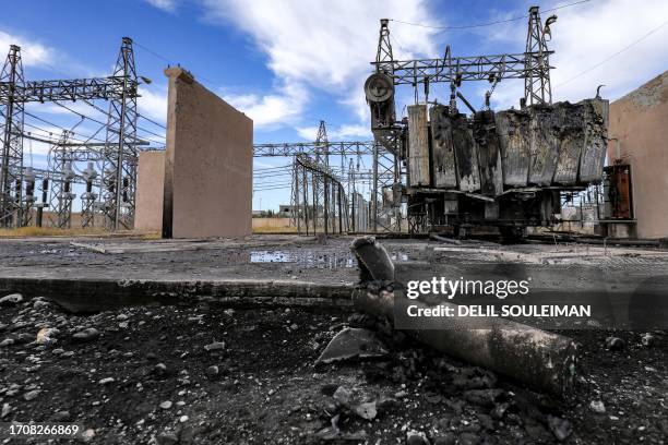 This picture taken on October 5, 2023 shows the remains of a missile fired at a destroyed electrical substation in Qamishli in northeastern Syria...