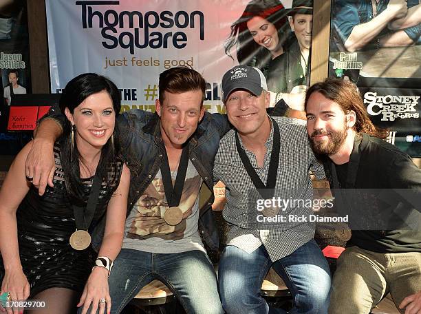 Shawna Thompson, Keifer Thompson, co-writer Jason Sellers and Paul Jenkins attend the Thompson Square Party For "If I Didn't Have You" at The Row on...