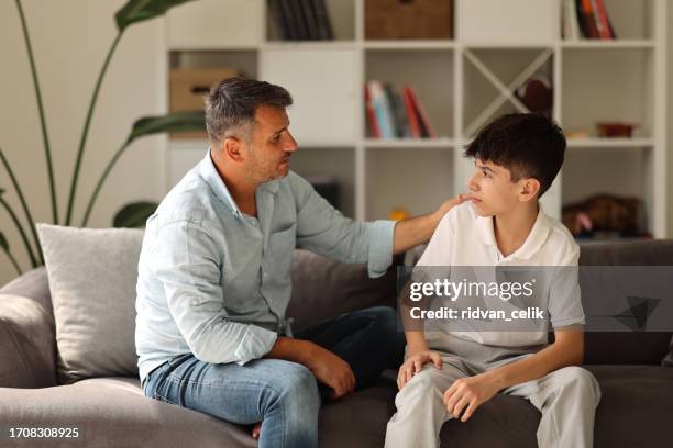 hearing a father's advice - parent stock pictures, royalty-free photos & images