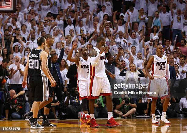 Dwyane Wade, LeBron James and Ray Allen of the Miami Heat celebrate after defeating the San Antonio Spurs during Game Six of the 2013 NBA Finals at...