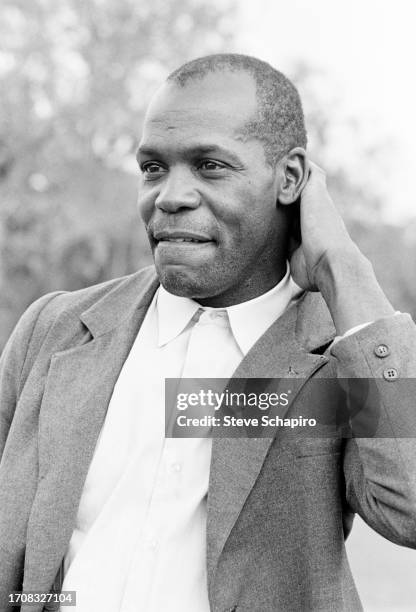 Portrait of American actor Danny Glover on the set of 'Places in the Heart' , Texas, 1984.