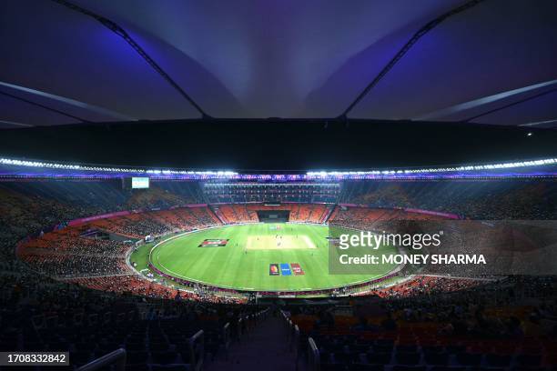 This picture shows a general view of the Narendra Modi Stadium during the 2023 ICC men's cricket World Cup one-day international match between...