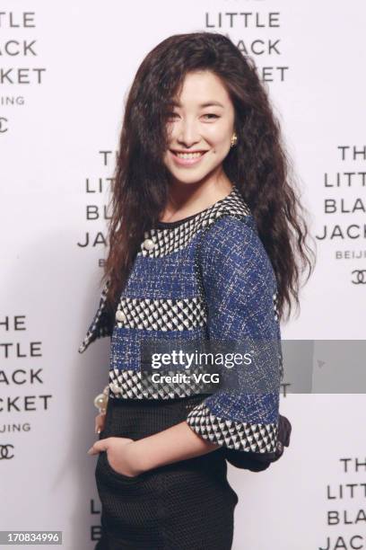 Zhu Zhu attends the opening of the Chanel: THE LITTLE BLACK JACKET Exhibition at 751 D.Park on June 18, 2013 in Beijing, China.