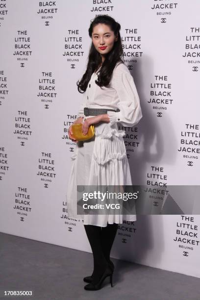 Chen Bige attends the opening of the Chanel: THE LITTLE BLACK JACKET Exhibition at 751 D.Park on June 18, 2013 in Beijing, China.