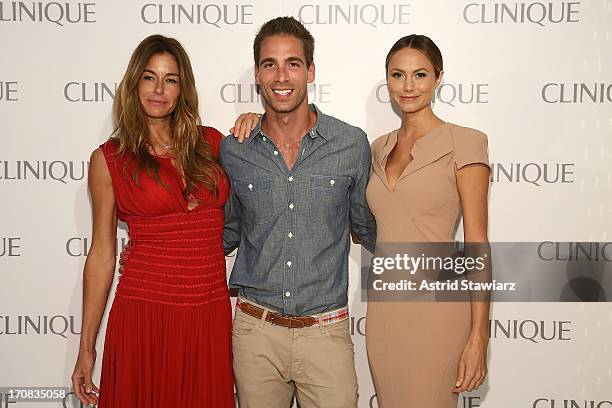 Kelly Killoren Bensimon, Simon Huck and Stacy Keibler attend Dramatically Different Party Hosted By Clinique at 620 Loft & Garden on June 18, 2013 in...