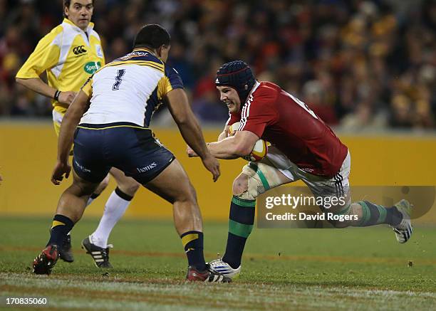 Sean O'Brien of the Lions takes on Ruan Smith during the International tour match between the ACT Brumbies and the British & Irish Lions at Canberra...