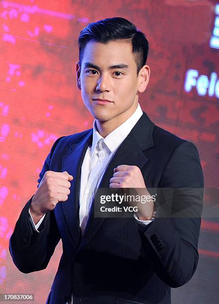 Actor Eddie Peng attends 'Unbeatable' press conference during the 16th Shanghai International Film Festival at Crown Plaza Hotel on June 18, 2013 in...