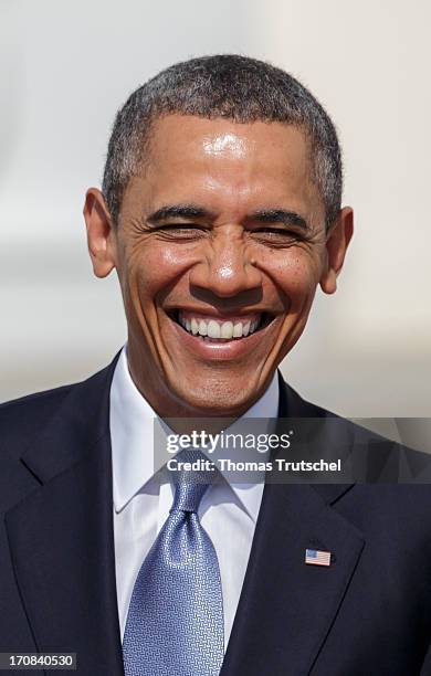 President Barack Obama smiles as he stands in front of Bellevue Castle on June 19, 2013 in Berlin, Germany. U.S. President Barack Obama is visiting...