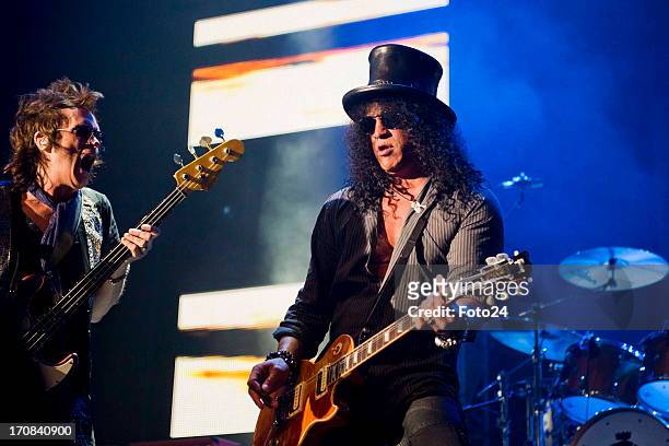 Musicians Glenn Hughes and Slash and Gilby Clarke during the Kings of Chaos concert on June 16, 2013 in Sun City, South Africa. Kings of Chaos...