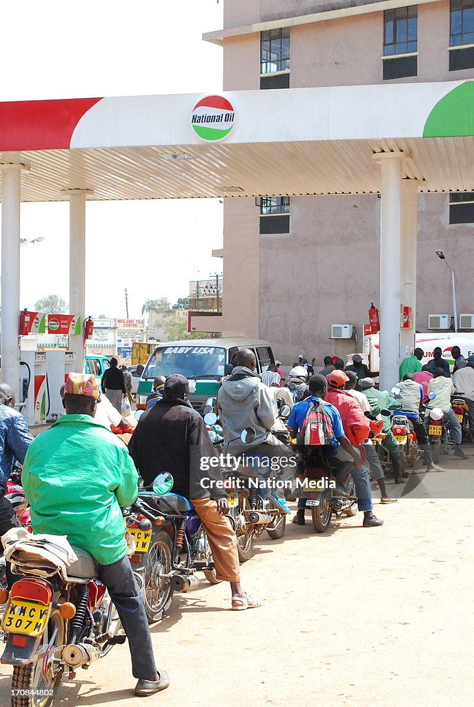 Kenyans use the Boda Boda Taxi