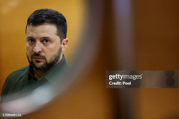 Ukraine's President Volodymyr Zelenskyy poses for a photo before a meeting with British Prime Minister Rishi Sunak during the European Political...