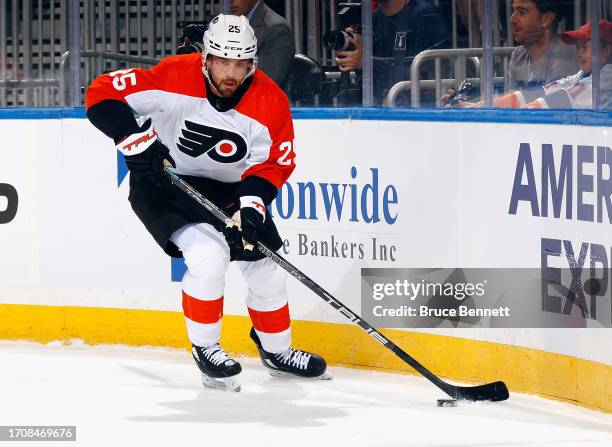 Ryan Poehling of Philadelphia Flyers skates against the New York Islanders during a preseason game at UBS Arena on September 27, 2023 in Elmont, New...