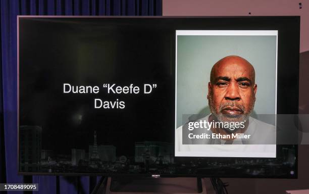 Booking photo of Duane Davis, photographed off of a television monitor, is shown during a news conference at the Las Vegas Metropolitan Police...