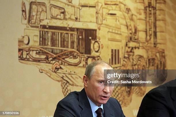 Russian President Vladmir Putin speaks during a meeting on military industry development at the Obukhov state plant on June 19, 2013 in in Saint...