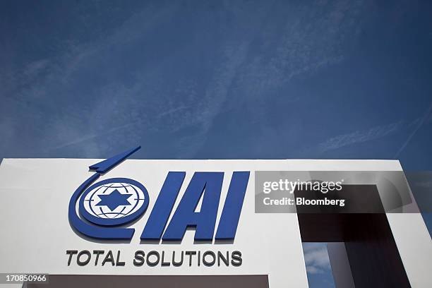 Logo sits above Israel Aerospace Industries Ltd.'s company's stand on the second day of the Paris Air Show in Paris, France, on Tuesday, June 18,...