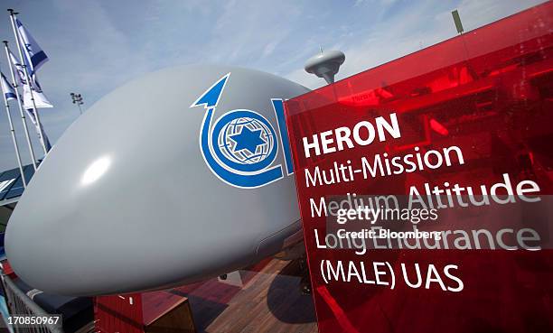 Unmanned air vehicle or drone, manufactured by Israel Aerospace Industries Ltd. , sits on display outside the company's stand on the second day of...