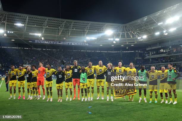 Players of Borussia Dortmund celebrate with the fans after winning the Bundesliga match between TSG Hoffenheim and Borussia Dortmund at PreZero-Arena...