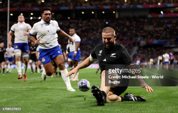 Dane Coles of New Zealand celebrates after scoring his team's thirteenth try during the Rugby World Cup France 2023 match between New Zealand and...