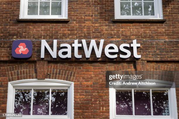 The NatWest Bank logo on the 5th of October 2023 in Ashford United Kingdom. National Westminster Bank also known as NatWest, is a major retail and...