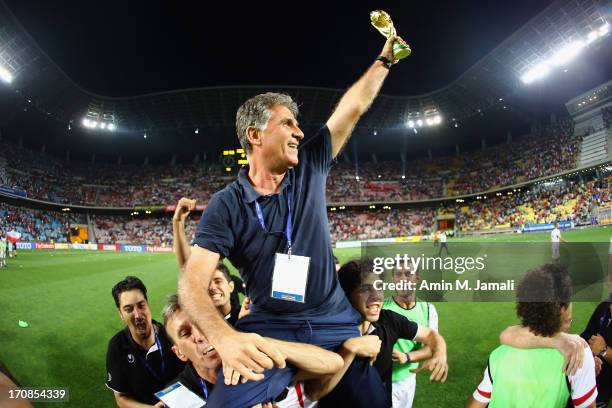 Iran coach, Carlos Queiroz celebrates during the FIFA 2014 World Cup Qualifier match between South Korea and Iran at Munsu Cup Stadium on June 18,...