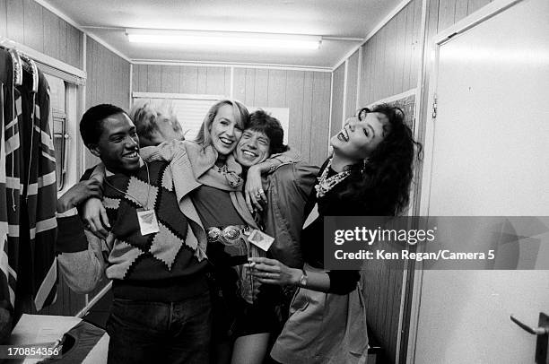 Mick Jagger of the Rolling Stones and Jerry Hall are photographed for the July 19, 1982 issue of People Magazine on June 25-26, 1982 backstage at...