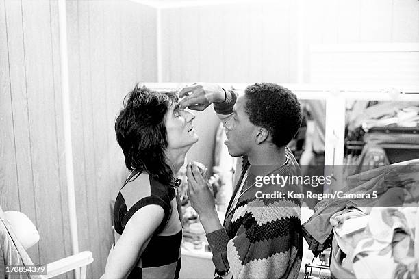 Ron Wood of the Rolling Stones is photographed for the July 19, 1982 issue of People Magazine on June 25-26, 1982 backstage at Wembley Stadium in...