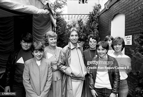 Charlie Watts of the Rolling Stones and family are photographed for the July 19, 1982 issue of People Magazine on June 25-26, 1982 backstage at...