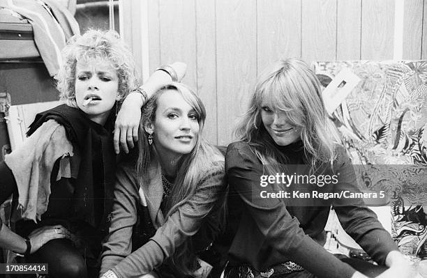 Jo Wood, Jerry Hall and Patti Hansen are photographed for the July 19, 1982 issue of People Magazine on June 25-26, 1982 backstage of a Rolling Stone...