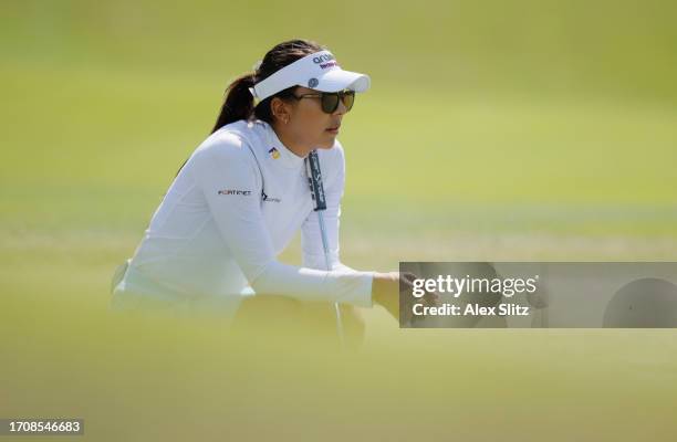 Alison Lee of the United States waits to putt on the second green during the first round of the Walmart NW Arkansas Championship presented by P&G at...