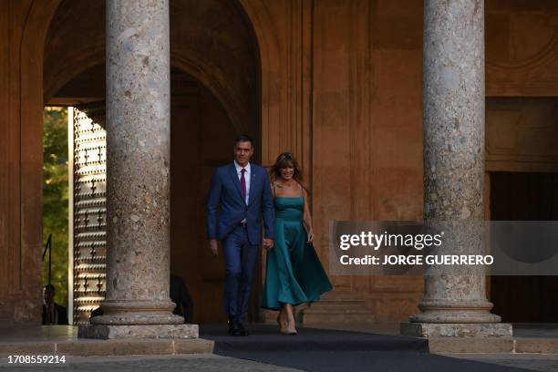 Spain's acting Prime Minister Pedro Sanchez and his wife Begona Gomez arrive at Carlos V Palace, at the Alhambra Palace in Granada, southern Spain on...