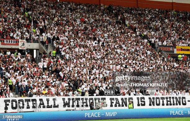 Freiburg's fans protest with a banner against the exclusion of West Ham fans banned from the match due to bad behaviour during a previous match,...